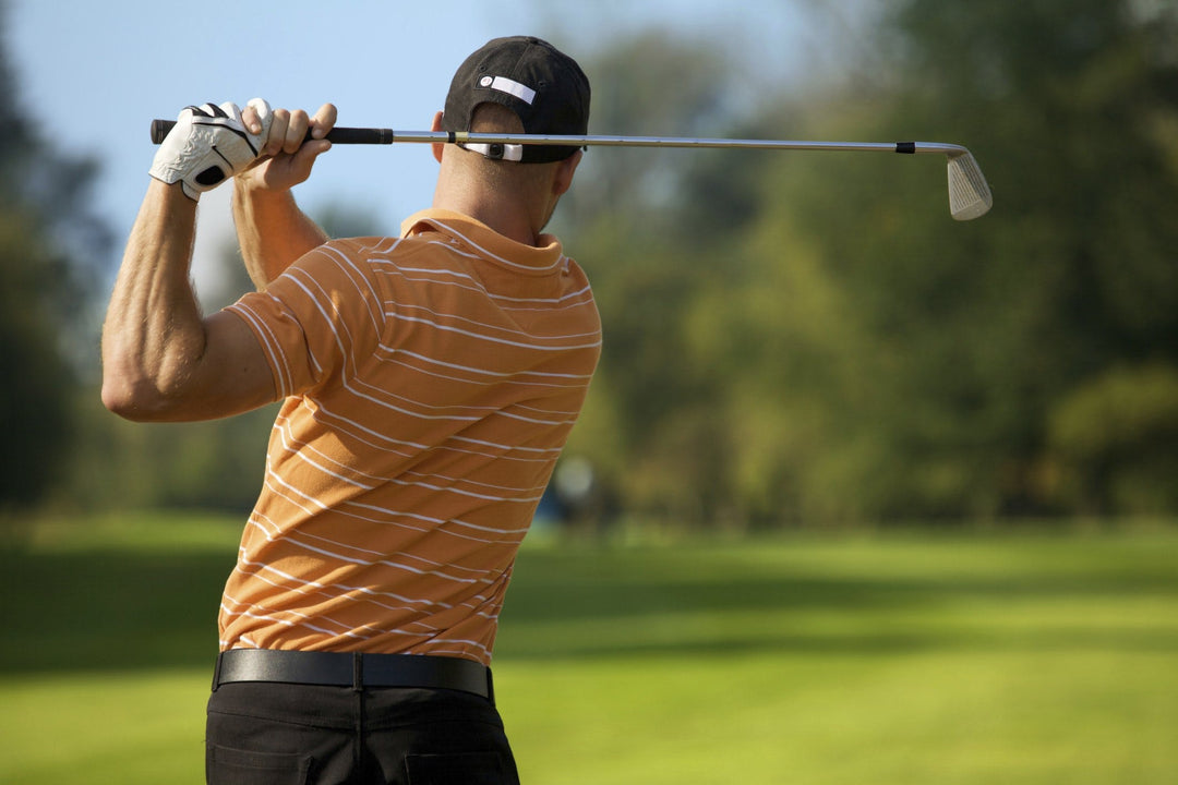 Så behandlar du en golfarmbåge Image