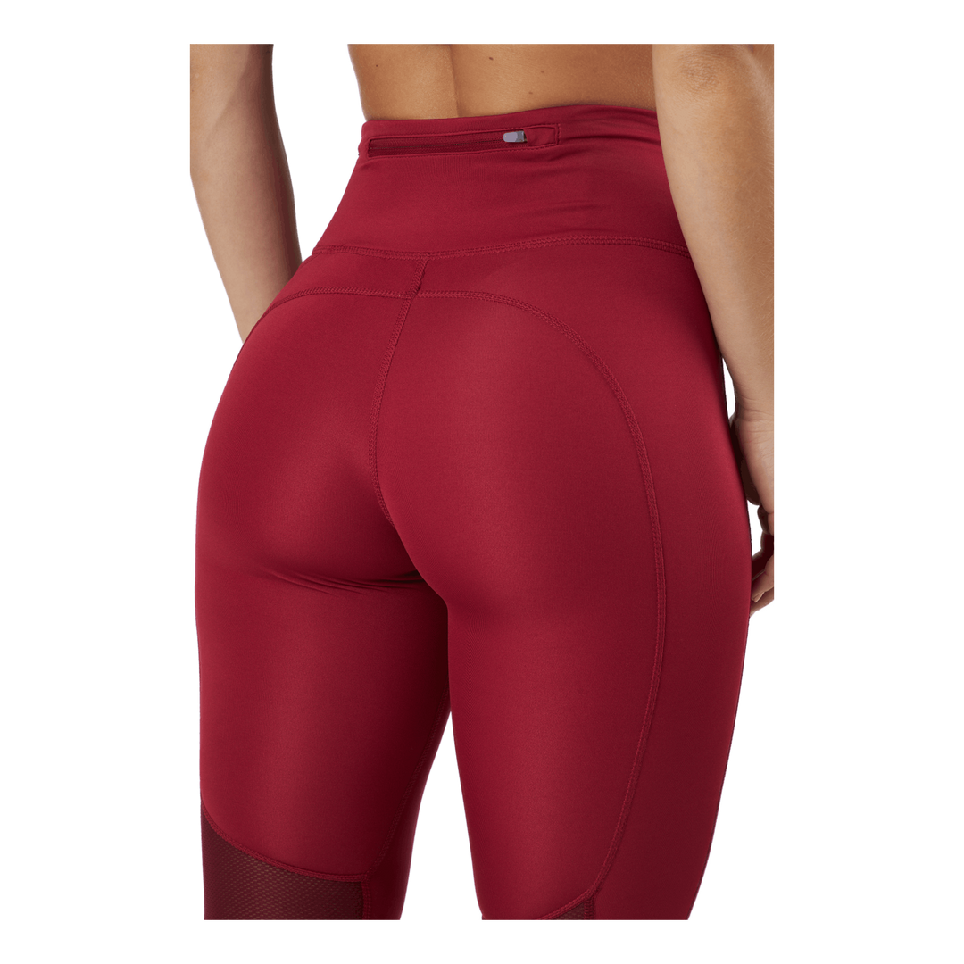 Nike Epic Fast Mid-Rise Leggings Pomegranate Keep running with the Nike  Epic Fast Mid-rise Leggings. Stretchy polyester blend supports your moves,  while mesh panels at the back of the knees give cool